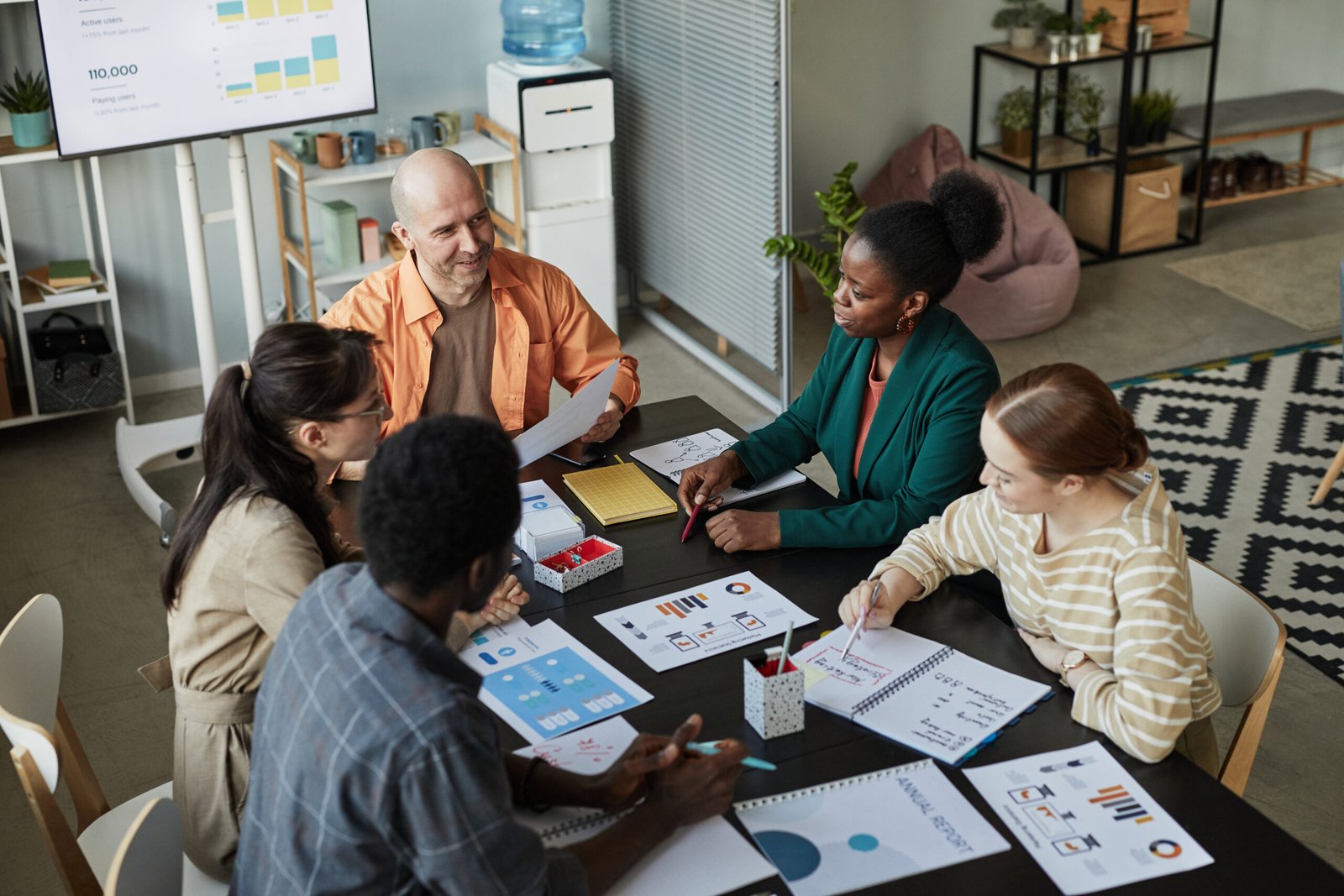 Diverse Business Team Meeting At Table Home Services Marketing Team Digital Marketing Agency